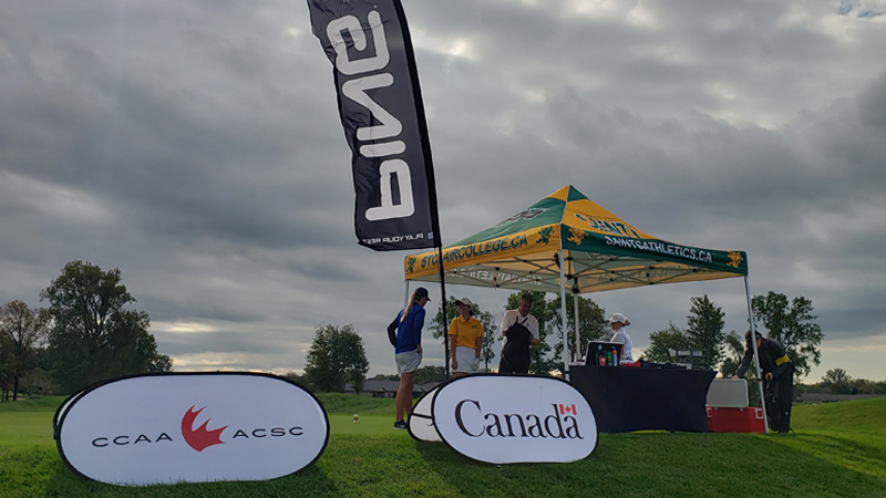 Windy conditions challenge golfers on Day One at the CCAA Championships